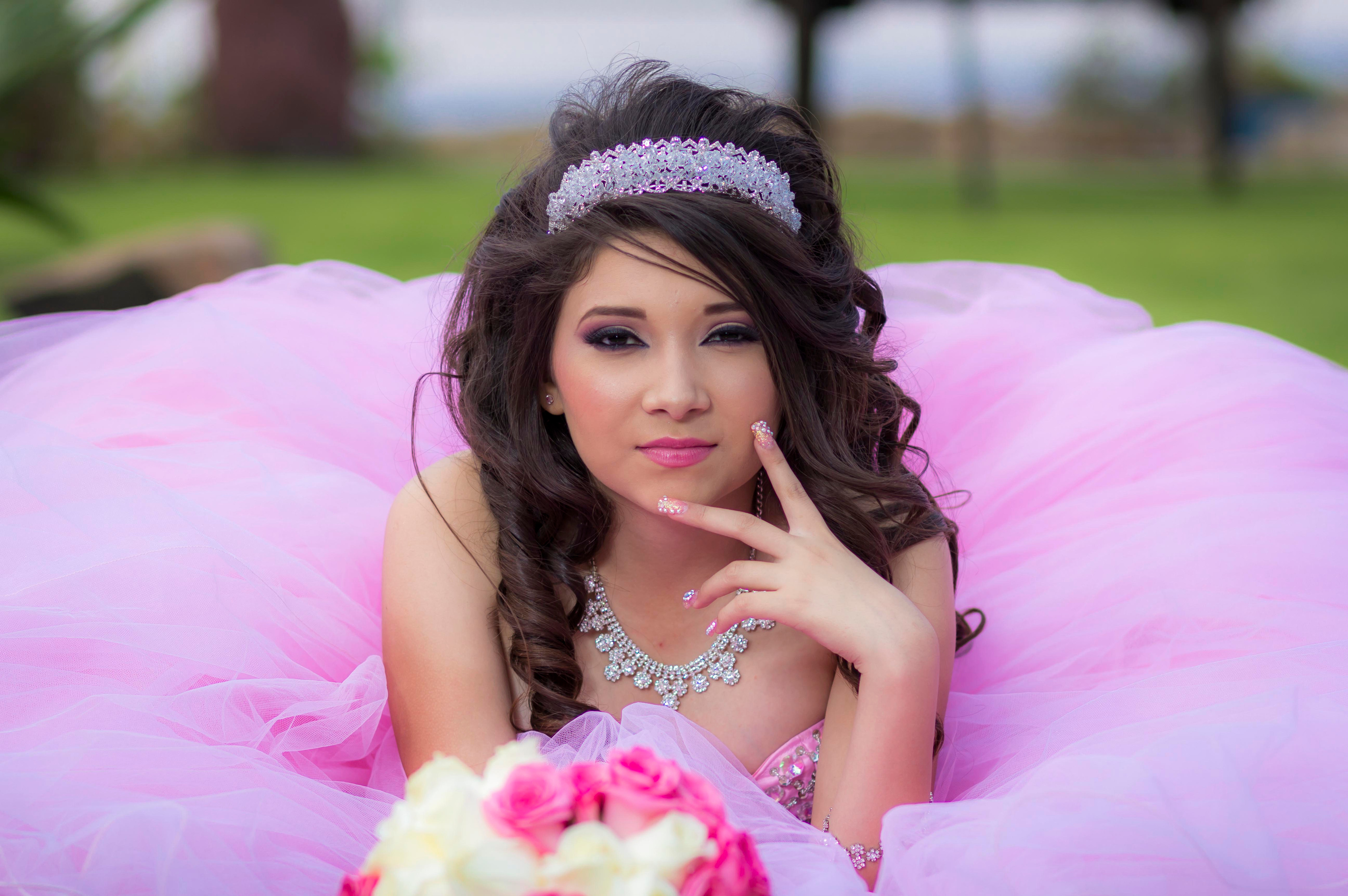 Woman in Pink Dress Wearing a Tiara